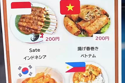 菊女フェスタのバザーで紹介される各国の料理のメニュー